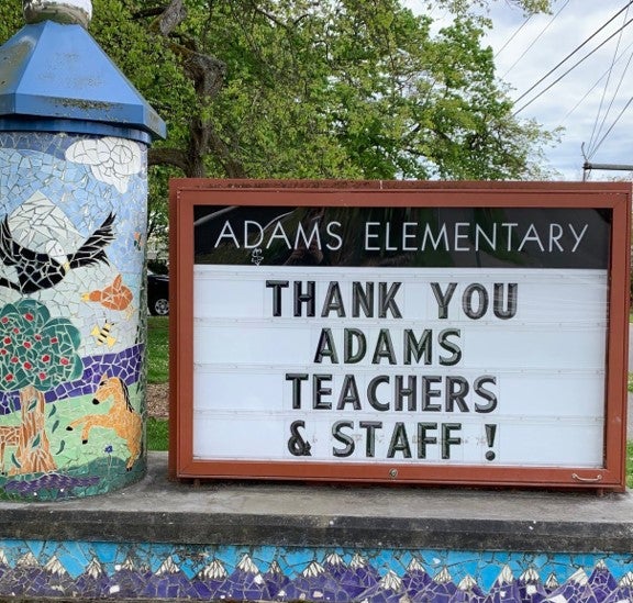 Adams elementary outdoor sign. it says thank you adams teachers and staff!